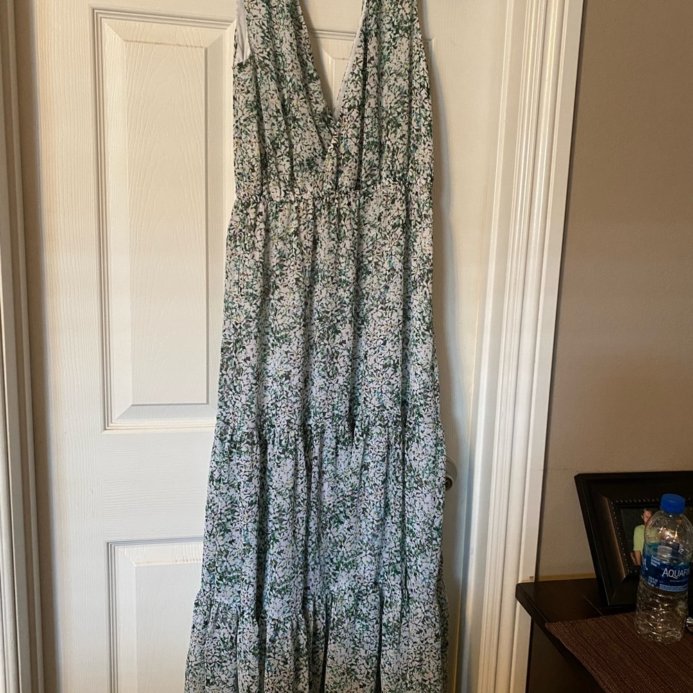 Beautiful maxi dress. Green, white and light shade of pink. Never worn.